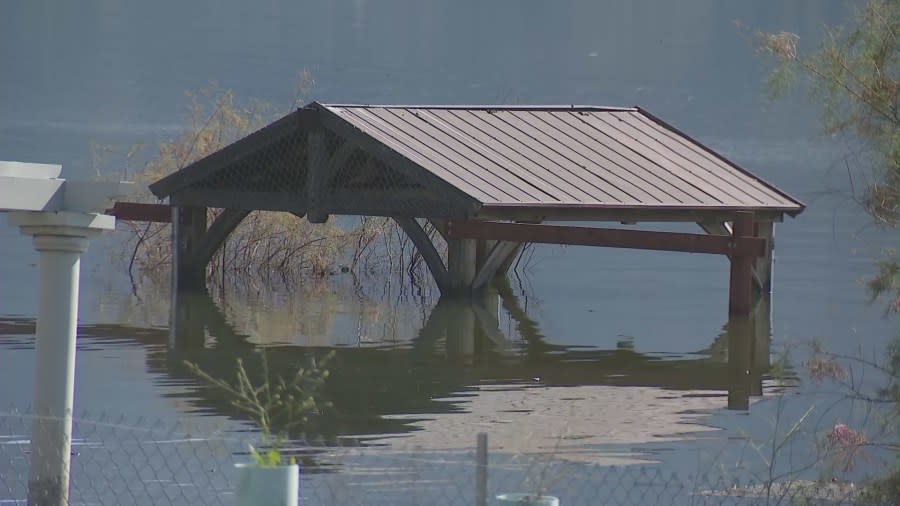 Structures are submerged in Lake Elsinore from a series of record-setting rainstorms. (KTLA)