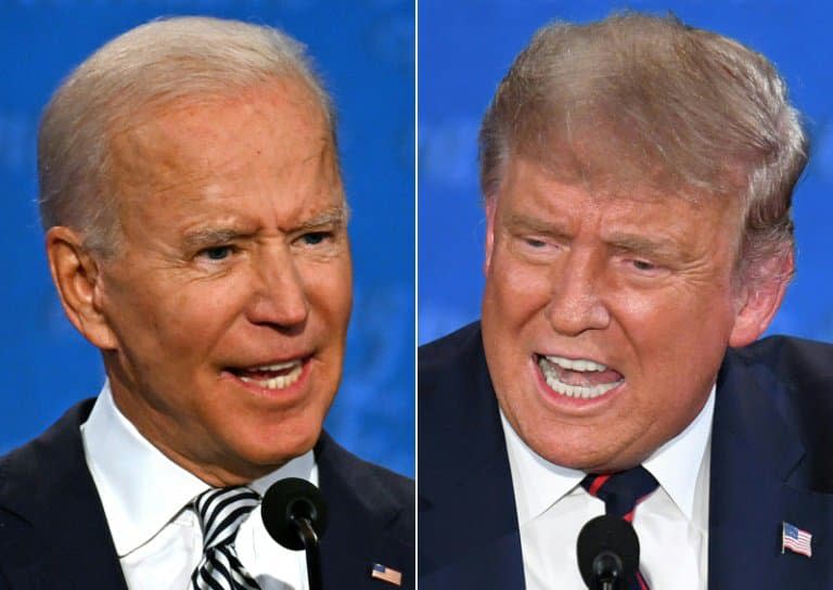 Le président américain Donald Trump et l'ancien vice-président Joe Biden lors de leur premier débat à Cleveland, dans l'Ohio, le 29 septembre 2020 - JIM WATSON, SAUL LOEB © 2019 AFP