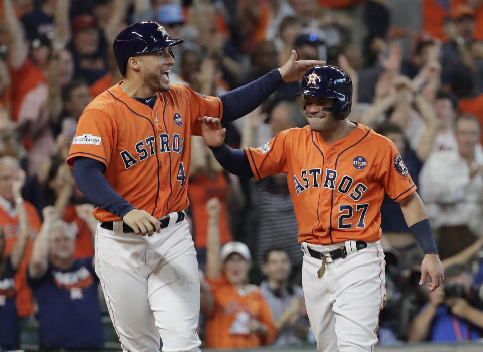 George Springer and Jose Altuve celebrate another big day of offense. (AP)