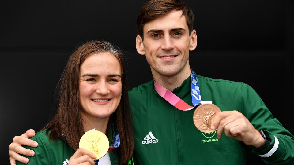 Kellie Harrington and Aidan Walsh with their medals from the Tokyo Olympics 