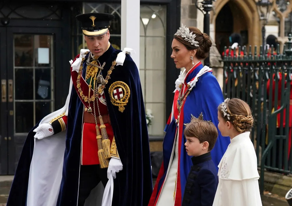 Prince William (from left) and Kate Middleton with their son Louis and daughter, Charlotte, arriving at King Charles III’s coronation. AP