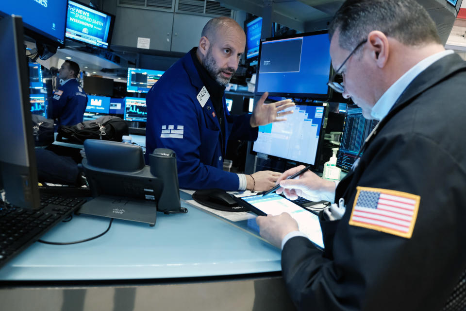 NEW YORK, NEW YORK - FEBRUARY 28: Traders work on the floor of the New York Stock Exchange (NYSE) after New York City Mayor Eric Adams rang the Opening Bell at the New York Stock Exchange (NYSE) on February 28, 2022 in New York, New York. Stocks plunged over 400 points as investors continue to weigh the situation in Ukraine as Russia continues its invasion of the nation. (Photo by Spencer Platt/Getty Images)