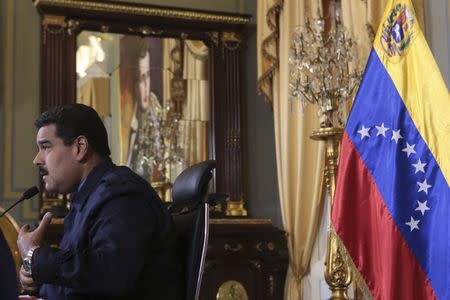 Venezuela's President Nicolas Maduro speaks during a national TV broadcast in Caracas in this March 9, 2015 picture provided by Miraflores Palace. REUTERS/Miraflores Palace/Handout via Reuters
