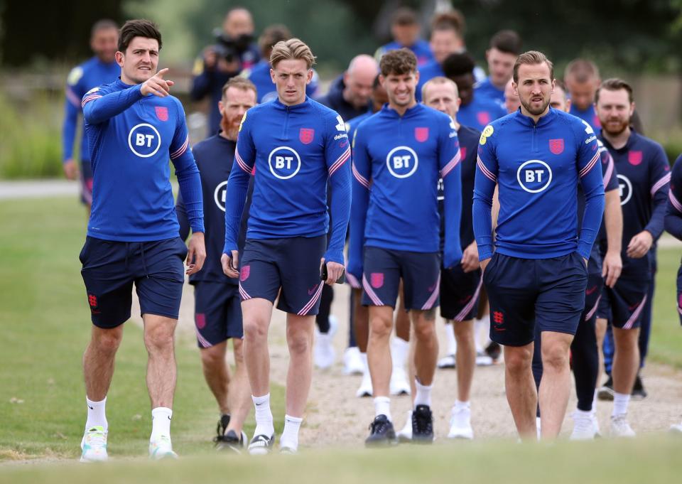 England players Harry Maguire, Jordan Pickford, John Stones and Harry Kane (PA)