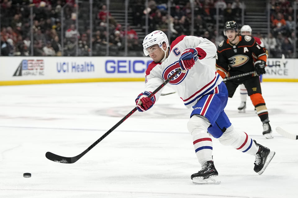 Montreal Canadiens center Nick Suzuki shoots the puck during the second period of an NHL hockey game against the Anaheim Ducks Friday, March 3, 2023, in Anaheim, Calif. (AP Photo/Mark J. Terrill)