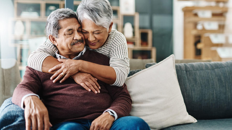 older woman hugging an older man