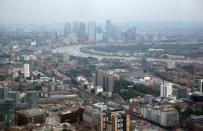 The Canary Wharf financial district is seen from the construction site of 22 Bishopsgate in London