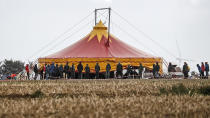 Cimate activists prepare at a camp near the Garzweiler surface coal mine at Keyenberg, Germany, Friday, Sept. 25, 2020. Several groups like 'Friday for Future' or 'Ende Gelaende' started actions for climate justice in the coming days throughout Germany. The movement demands that the German government phase out coal by 2030 and make Germany carbon neutral by 2035. (AP Photo/Martin Meissner)