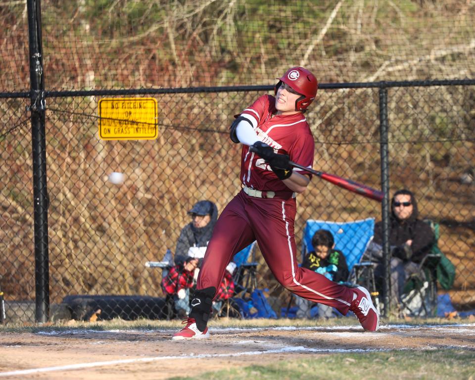 Portsmouth senior Sebastian Lampert laces an RBI single in Monday's Division I season-opening 4-3 loss to Nashua North. Lampert had two hits on the day for the Clippers.
