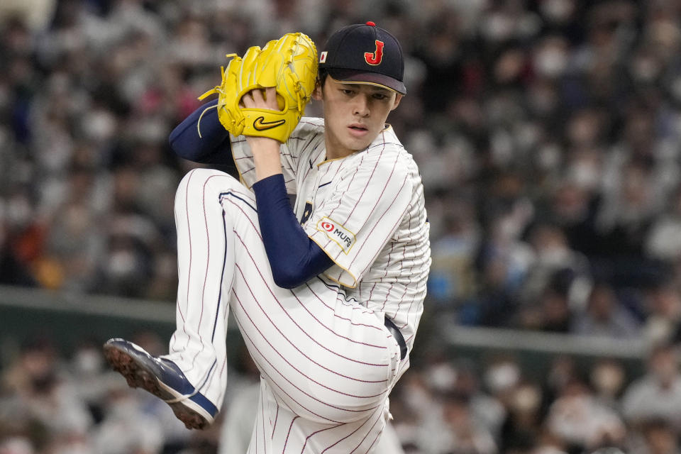 Roki Sasaki of Japan pitches during their Pool B game against the Czech Republic at the World Baseball Classic at the Tokyo Dome, Japan, Saturday, March 11, 2023. (AP Photo/Eugene Hoshiko)