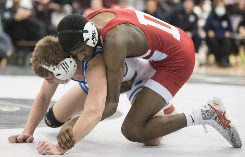 Delsea's Jamar Dixon, top, controls Oakcrest's Hunter Horsey during the 132-pound final of the Region 8 wrestling championships at Egg Harbor Township High School, Saturday, Feb. 26, 2022.  Dixon defeated Horsey, 3-2.