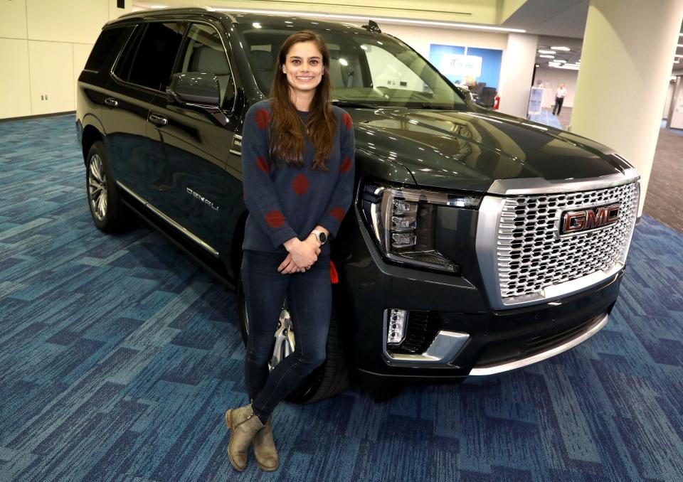 General Motors engineer Alex Archer with the 2021 GMC Yukon on Thursday, January 23, 2020 that she had a role in designing part of the interior.
Archer worked on the new and innovative power console that with the push of a button can slide back and forth to revel lots of storage space giving owners an extra 10-cubic inches of storage in the popular selling SUV.