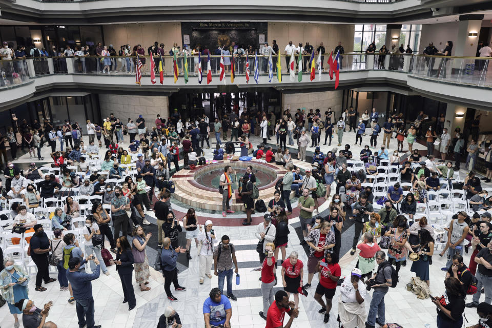 Protestors gather in the atrium of Atlanta City Hall to protest the proposed police training center on Monday, June 5, 2023. (Natrice Miller/Atlanta Journal-Constitution via AP)