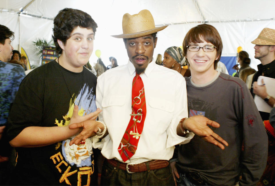 Andre 3000 (C) and actors Drake Bell (L) and Josh Peck (R) (Photo by Frazer Harrison/Getty Images)