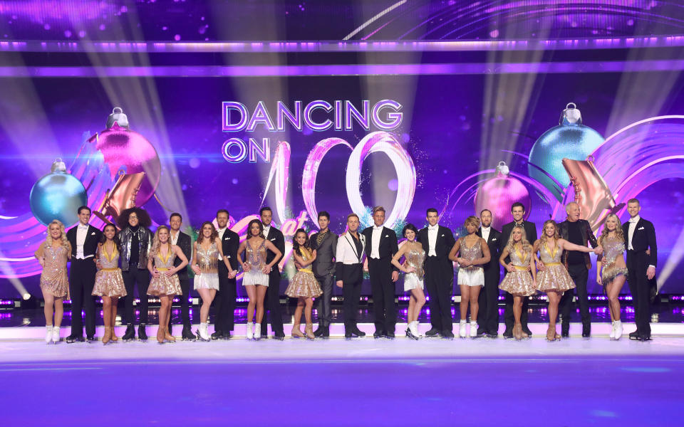 LONDON, ENGLAND - DECEMBER 09: Lisa George, Tom Naylor, Perri Kiely, Alexandra Schauman, Joe Swash, Libby Clegg, Carlotta Edwards, Maura Higgins, Mark Hanretty, Ian "H" Watkins, Matt Evers, Lucrezia Millarini, Brendan Hatfield, Trisha Goddard, Lukasz Rozycki, Kevin Kilbane, Brianne Delcourt, Alex Murphy, Michael Barrymore, Caprice Bourret and Hamish Gaman during the Dancing On Ice 2019 photocall at ITV Studios on December 09, 2019 in London, England. (Photo by Mike Marsland/WireImage)