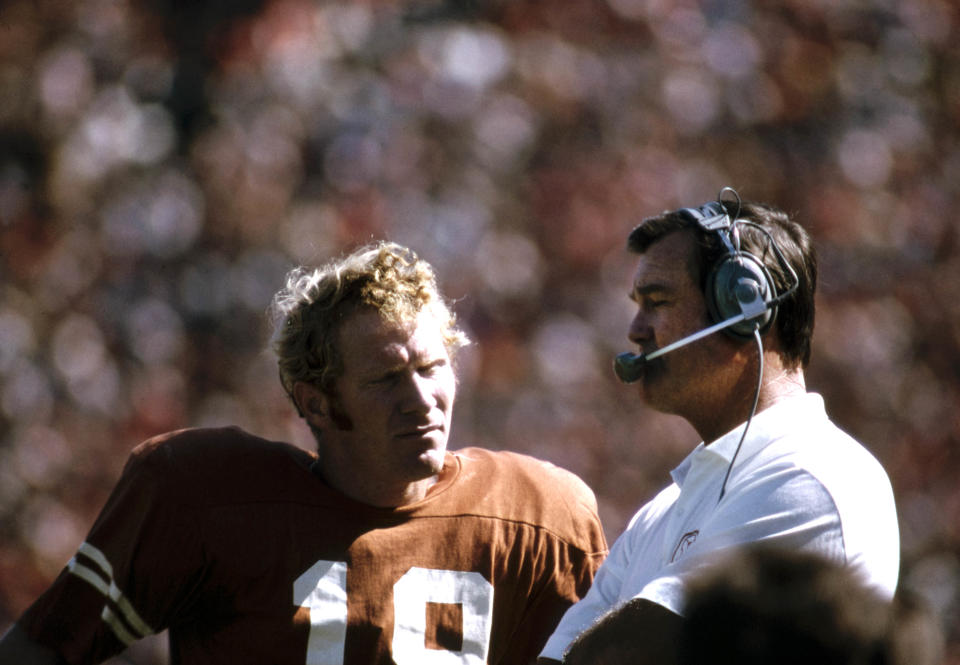 Oct. 1, 1971; Dallas, Texas; Texas Longhorns head coach Darrell Royal (right) talks to Donnie Wigginton (18) on the sideline during the 1971 season. Malcolm Emmons-USA TODAY Sports