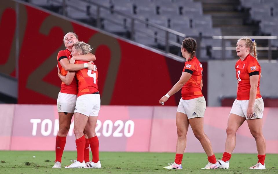 Great Britain celebrate at the final whistle - REUTERS