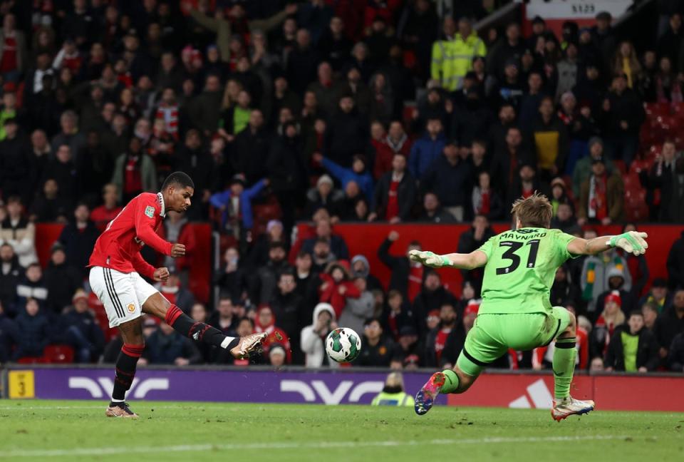 Marcus Rashford shoots past Ashley Maynard-Brewer (Getty Images)