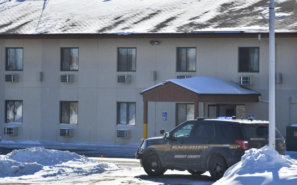 Wright County Sheriff's Department vehicles surrounded the Super 8 Motel connected with the scene of a shooting at the Allina Medical Clinic Tuesday, Feb. 9, 2021, in Buffalo. 