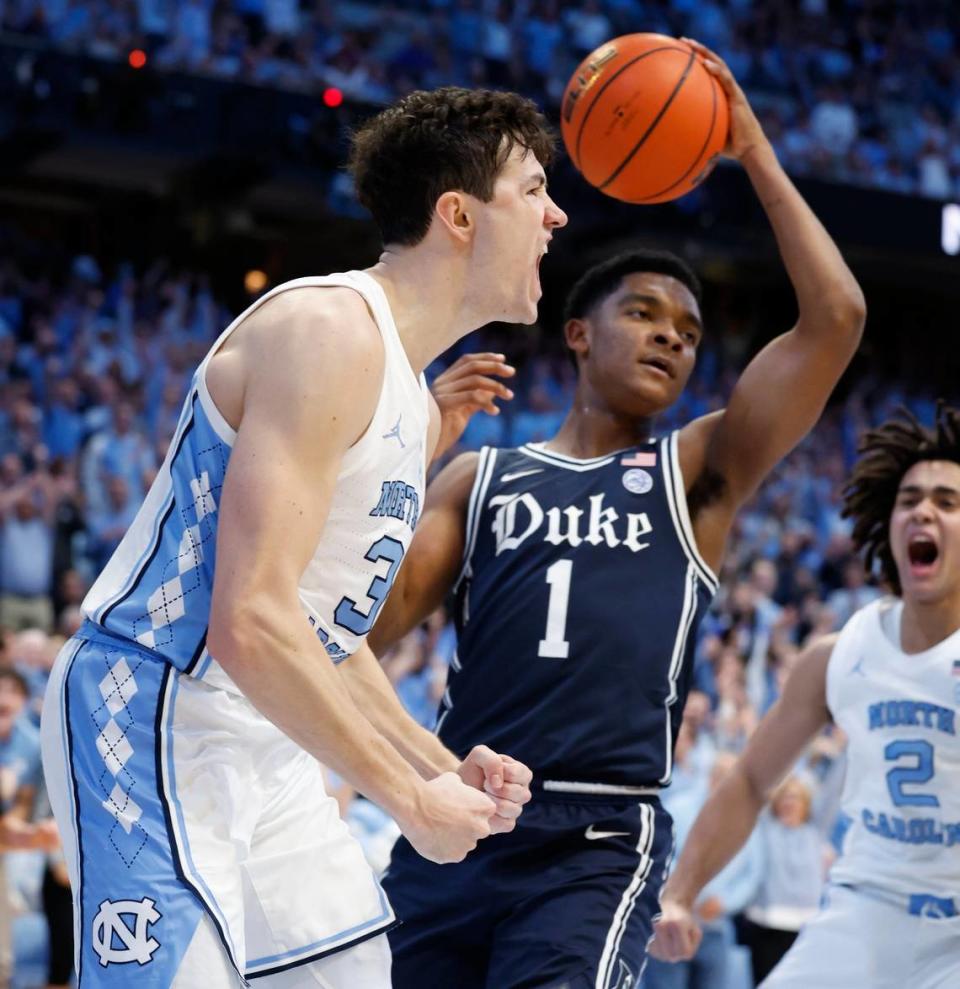 North Carolina’s Cormac Ryan (3) celebrates after making the basket while being fouled during the first half of Duke’s game against UNC at the Smith Center in Chapel Hill, N.C., Saturday, Feb. 3, 2024.