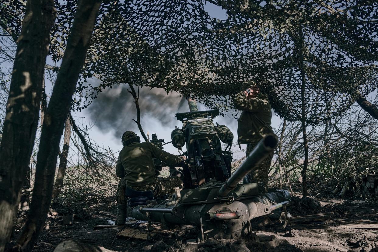 Ukrainian soldiers fire a cannon near Bakhmut (Copyright 2023 The Associated Press. All rights reserved.)