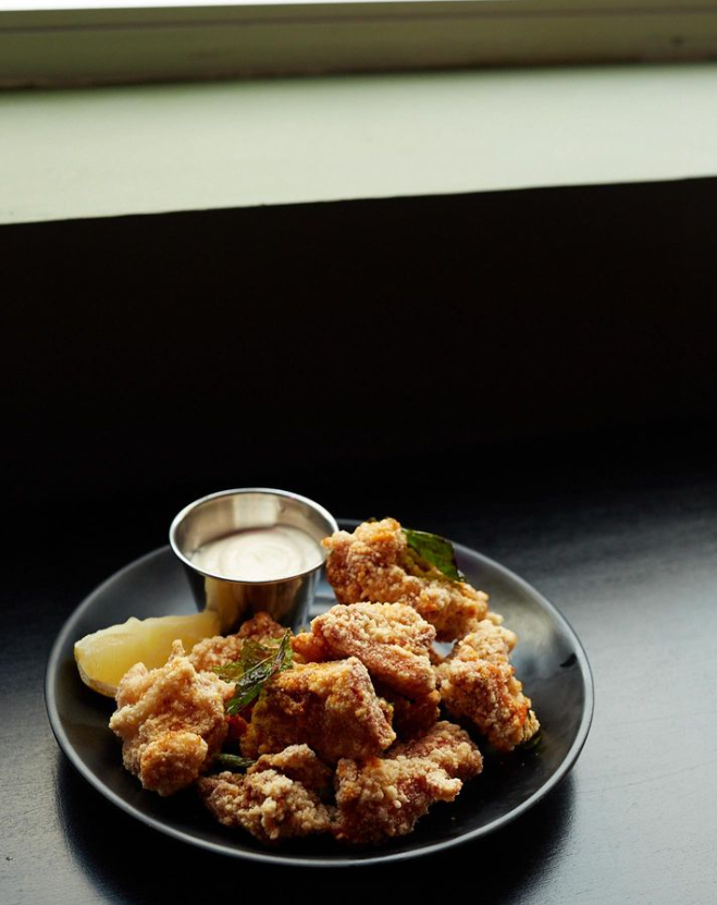 Cobra offers a full food menu until midnight and an abbreviated late-night menu until 2:30 a.m. The koji-brined Popcorn chicken, pictured above, is on both.