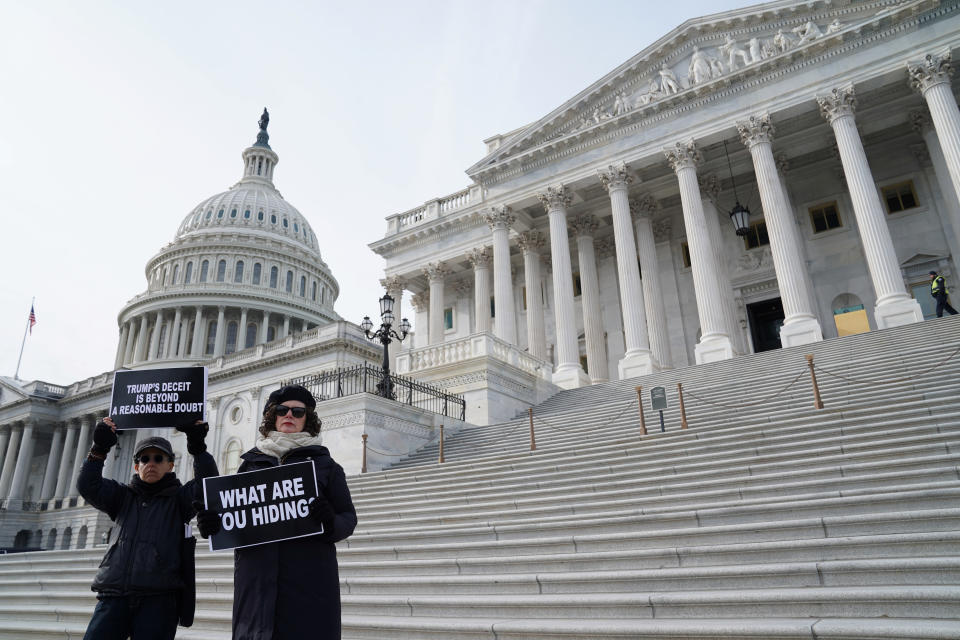 People demonstrate outside of the U.S. Capitol on the third day of the Senate impeachment trial of U.S. President Donald Trump in Washington, U.S., January 23, 2020. REUTERS/Sarah Silbiger