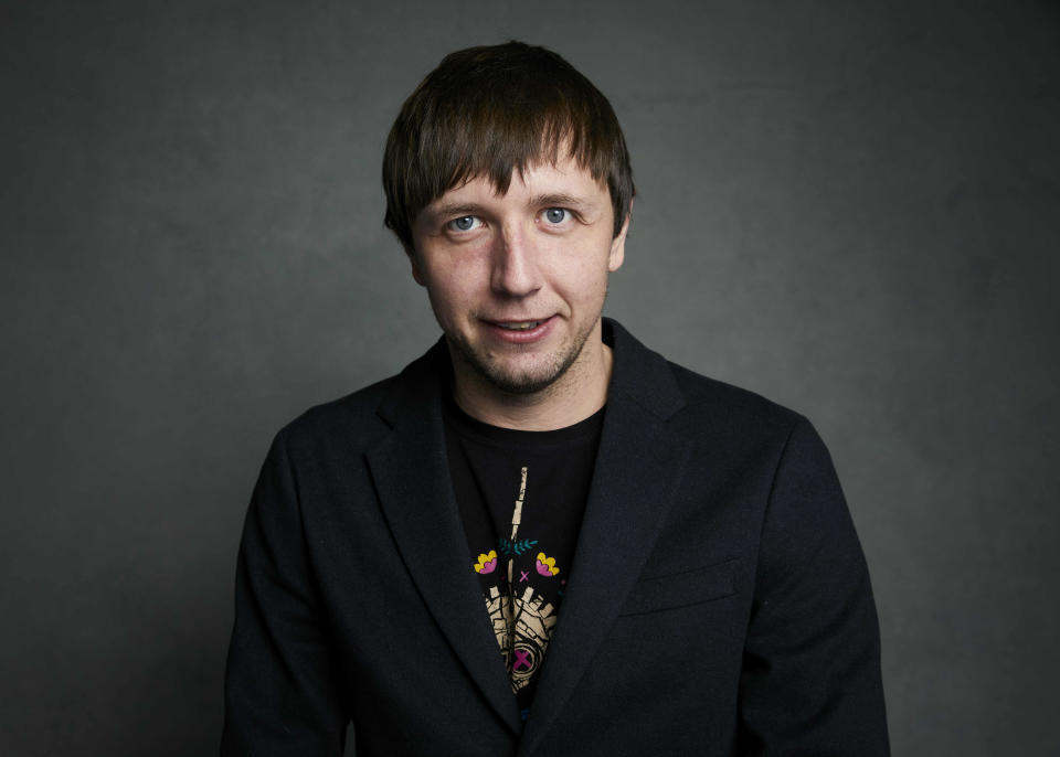 FILE - Photographer Evgeniy Maloletka poses for a portrait to promote the film "20 Days in Mariupol" at the Latinx House during the Sundance Film Festival, Jan. 22, 2023, in Park City, Utah. Four Associated Press journalists, including Maloletka, were honored Sunday, Feb. 19, with the George Polk Award for War Reporting for their searing coverage of Russia’s invasion of Ukraine, which Ukrainian officials have credited with saving many lives. (Photo by Taylor Jewell/Invision/AP, File)