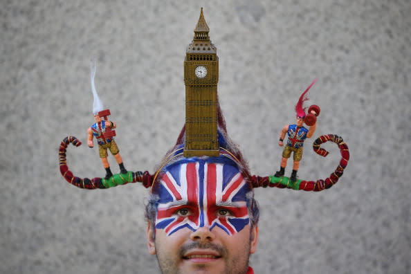 Chris Wilkinson wears a hair sculpture depicting Parliament's Clock Tower known as Big Ben on August 9, 2012 in London, England. Created by Catalonian performance artists Osadia, these sculpted hair pieces are a tribute the success of Team GB in the London 2012 Olympics and will be touring London as part of Showtime a large London outdoor arts festival. (Photo by Peter Macdiarmid/Getty Images)