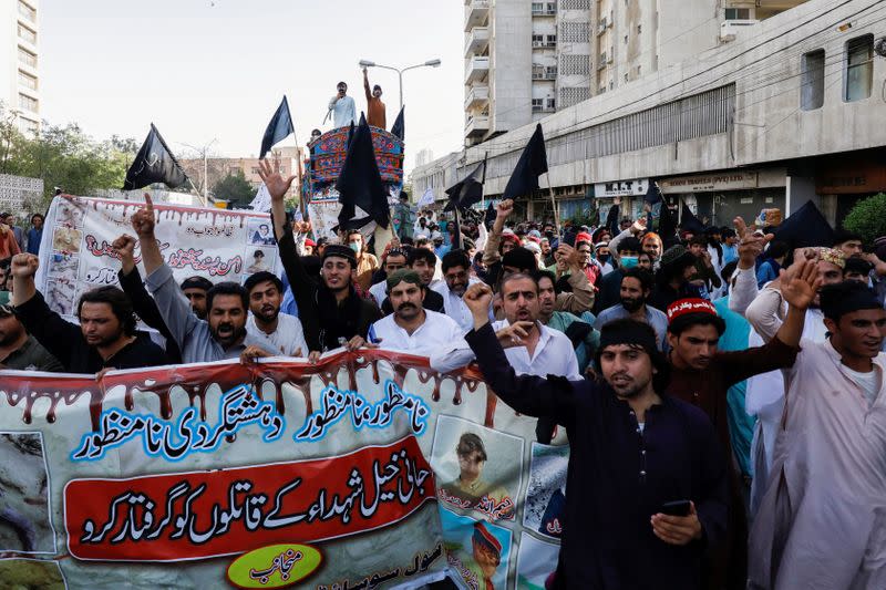 People chant slogans demanding an investigation following the deaths of four teenagers in Jani Khel area in Bannu District of Khyber Pakhtunkhwa (KPK) province, during a protest in Karachi,