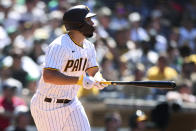 San Diego Padres' Eric Hosmer watches his hit against the Oakland Athletics in the sixth inning of a baseball game Wednesday, July 28, 2021, in San Diego. (AP Photo/Derrick Tuskan)