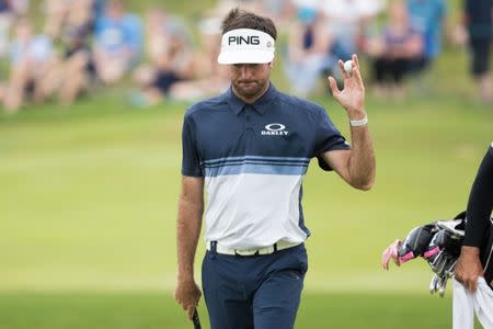 Jun 24, 2018; Cromwell, CT, USA; Bubba Watson walks of the 17th green during the final round of the Travelers Championship at TPC River Highlands. Mandatory Credit: Bill Streicher-USA TODAY Sports