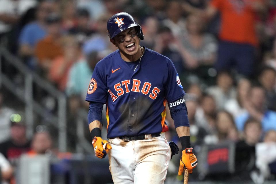 Houston Astros' Mauricio Dubon reacts after being called out on strikes during the seventh inning of a baseball game against the Texas Rangers Sunday, April 16, 2023, in Houston. (AP Photo/David J. Phillip)