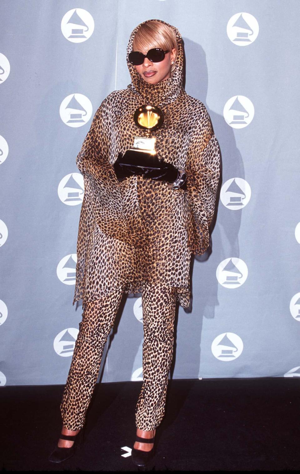 <p>Mary J. Blige wore leopard print from head to toe for her 1996 Grammys look. She accessorized with neutral black sunglasses, gloves, and shoes to balance her wild ensemble.</p>
