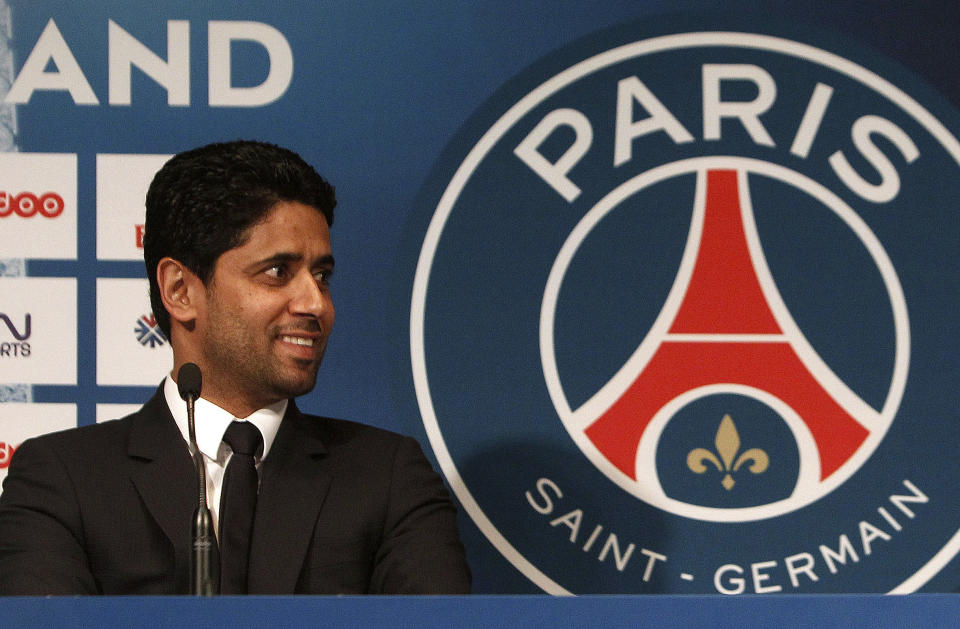 FILE - In this Wednesday, Jan. 29, 2014 file photo PSG President Nasser Al-Khelaifi smiles during a press conference, at the Parc des Princes stadium in Paris. In a verdict handed down Friday Oct. 30, 2020, Swiss federal judges acquitted the Qatari president of Paris Saint-Germain Nasser Al-Khelaifi. (AP Photo/Thibault Camus, File)