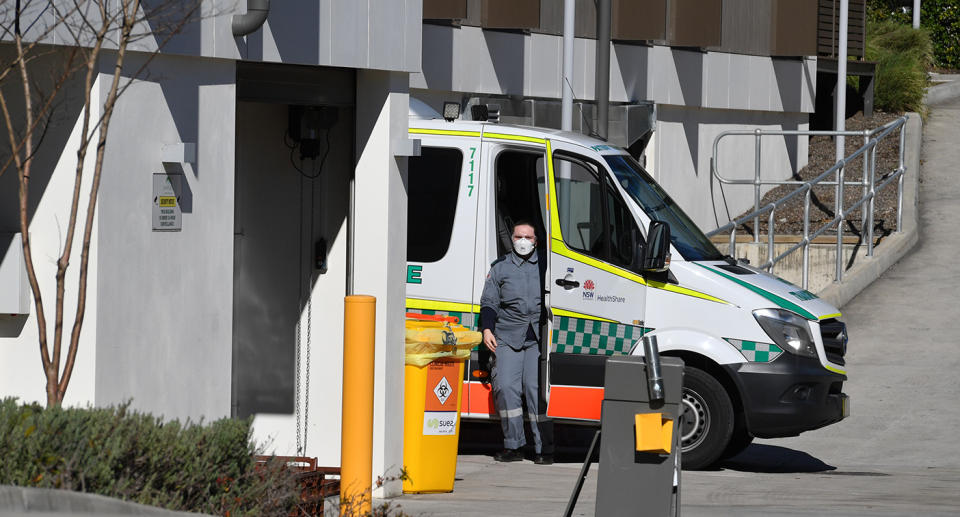 An ambulance is seen at the SummitCare aged care home at Baulkham Hills in Sydney on Monday. Source: AAP