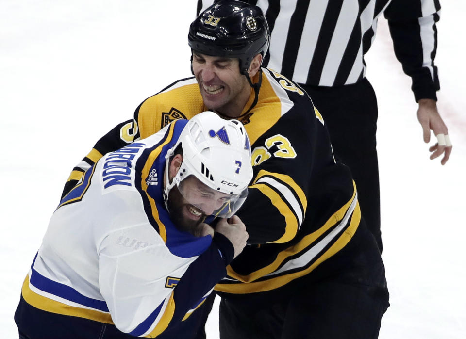 FILE - In this Jan. 17, 2019, file photo, Boston Bruins defenseman Zdeno Chara (33) and St. Louis Blues left wing Pat Maroon (7) fight during the first period of an NHL hockey game, in Boston. Game 1 of the Stanley Cup finals between the Bruins and Blues is Monday, May 27. (AP Photo/Elise Amendola, File)