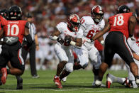 Indiana running back Shaun Shivers carries the ball during the first half of an NCAA college football game against Cincinnati, Saturday, Sept. 24, 2022, in Cincinnati. (AP Photo/Aaron Doster)