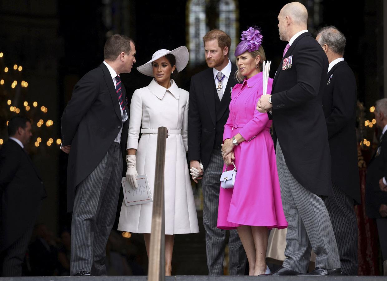 Peter Phillips, Prince Harry, Meghan, Duchess of Sussex, left, and Zara Tindall and Mike Tindall leave after attending a service of thanksgiving for the reign of Queen Elizabeth II at St Paul’s Cathedral in London Friday, June 3, 2022,