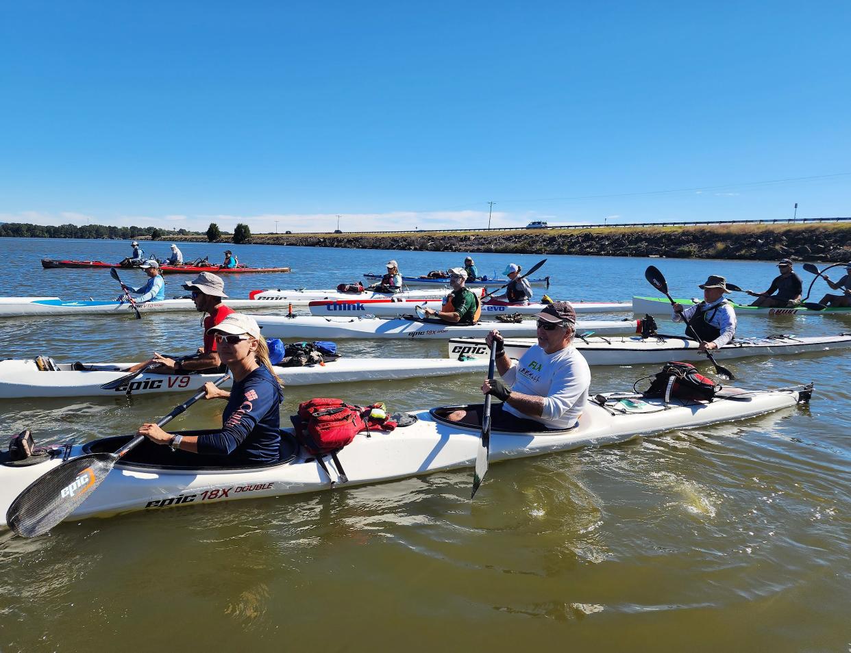 Paddlers set off at the start of the 2022 Great Alabama 650 paddle race. This year's event begins Saturday from the same spot, at Weiss Lake in Cherokee County.