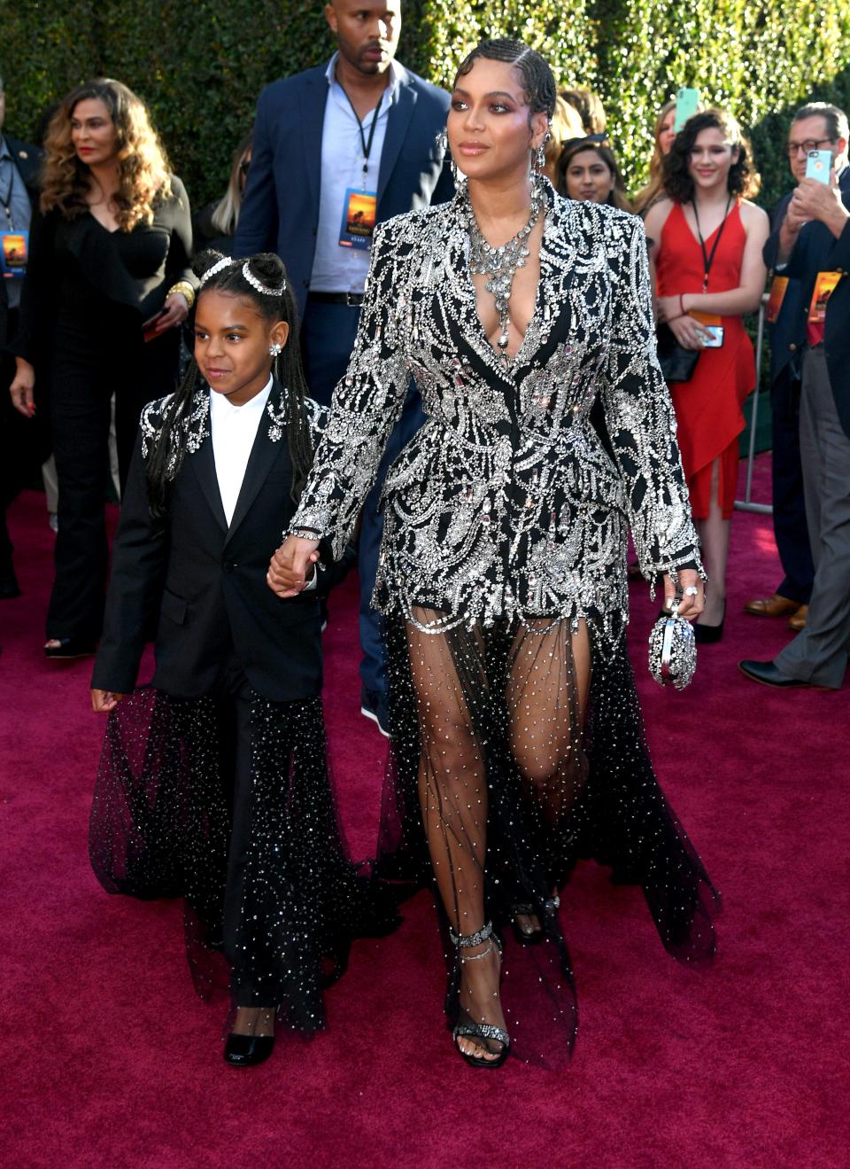 Blue Ivy Carter won her first Grammy Award in 2021 for best music video for "Brown Skin Girl," on which Blue Ivy is credited as a featured artist, making her the second-youngest person to win a Grammy. Here, the mother-daughter duo attend the premiere of Disney's "The Lion King" at Dolby Theatre on July 09, 2019, in Hollywood, California.