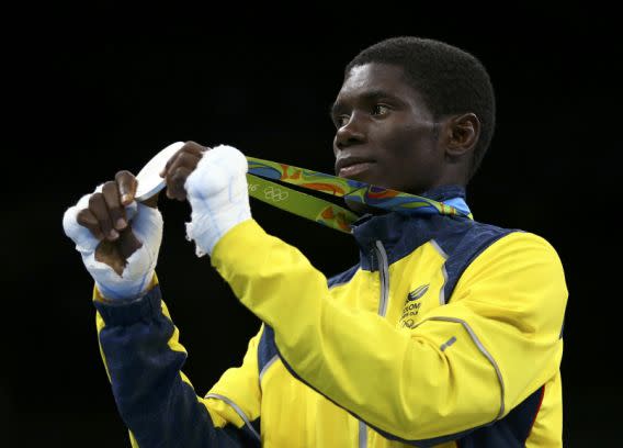 2016 Rio Olympics - Boxing - Victory Ceremony - Men's Light Fly (49kg) Victory Ceremony - Riocentro - Pavilion 6 - Rio de Janeiro, Brazil - 14/08/2016. Yuberjen Martinez Rivas (COL) of Colombia poses with his silver medal during the victory ceremony. REUTERS/Peter Cziborra FOR EDITORIAL USE ONLY. NOT FOR SALE FOR MARKETING OR ADVERTISING CAMPAIGNS