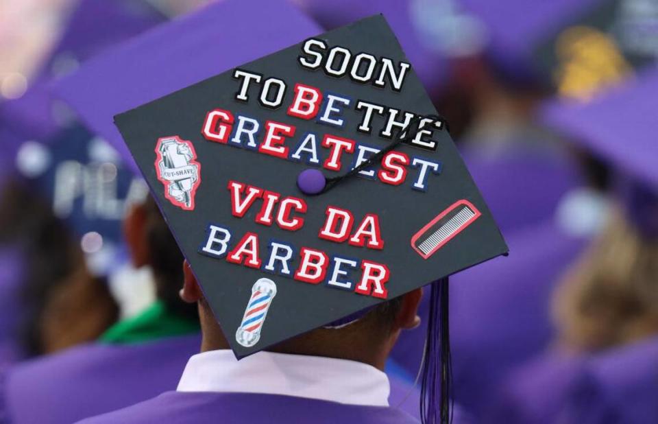 A Madera South High graduate uses his mortar board to express himself during the graduation ceremony at Madera Memorial Stadium on June 7, 2023.