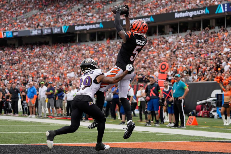 Wide receiver Tee Higgins pulls in one of his two touchdown passes against the Ravens Sunday. Higgins, who didn't catch a pass against the Browns in Week One, had eight catches for 89 yards and two touchdowns Sunday.