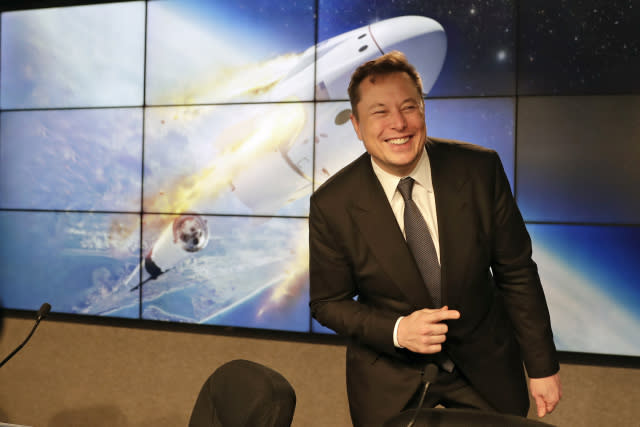 Elon Musk, founder, CEO, and chief engineer/designer of SpaceX speaks during a news conference after a Falcon 9 SpaceX rocket test flight to demonstrate the capsule's emergency escape system at the Kennedy Space Center in Cape Canaveral, Fla., Sunday, Jan. 19, 2020. (AP Photo/John Raoux)