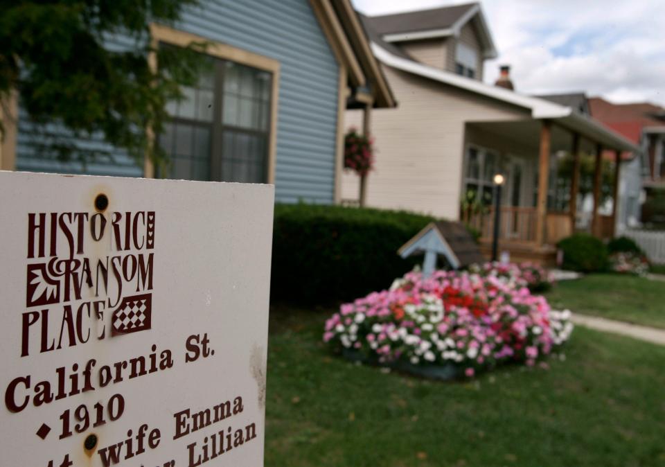 Houses line California St. in historic Ransom Place, Wednesday, Oct. 24, 2007, many with history information signs.