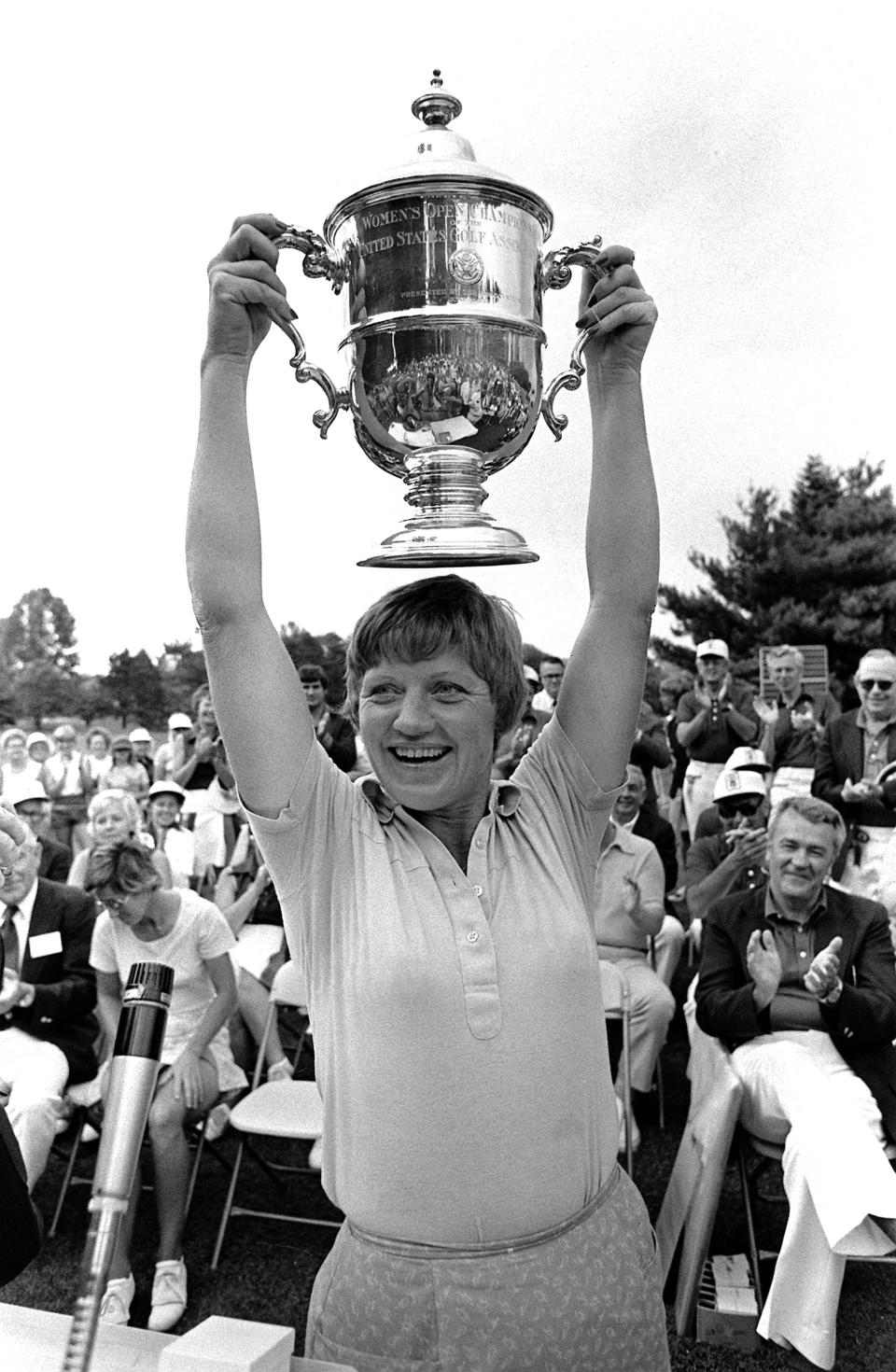 JoAnne Carner shows her trophy after winning the U.S. Women's Open Golf Tournment in suburban Philadelphia, Pa., Monday, July 12, 1976. (AP Photo/Hires)