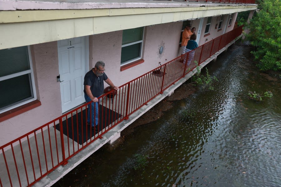 Ken Kruse looks out at the flood waters from Hurricane Idalia surrounding his apartment complex on August 30, 2023 in Tarpon Springs, Florida. Hurricane Idalia is hitting the Big Bend area of Florida. (Photo by Joe Raedle/Getty Images)