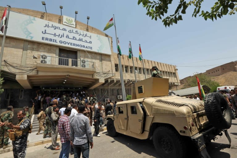 Kurdish security forces deploy outside the governor's headquarters in Arbil, the capital of Iraqi Kurdistan, scene of an attack that killed one employee and three gunmen on July 23, 2018