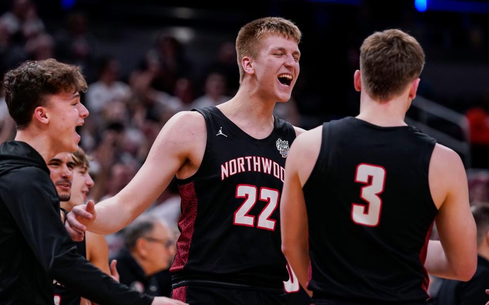 NorthWood Panthers Tyler Raasch (22) yells in excitement on Saturday, March 25, 2023 at Gainbridge Fieldhouse in Indianapolis. The NorthWood Panthers lead at the half against the Guerin Catholic Golden Eagles, 66-63, in the IHSAA Class 3A state finals championship. 